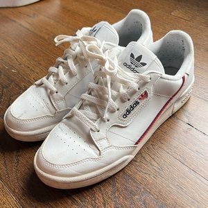 Adidas white sneakers with red and dark blue stripe